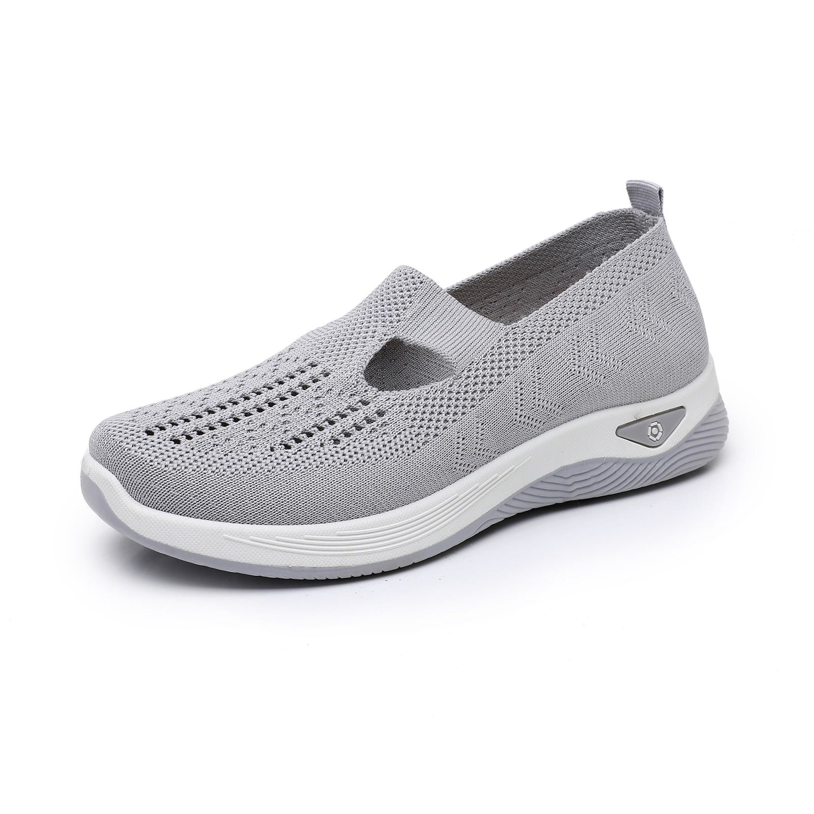 Grey knit mesh slip-on walking flat with white cushioned platform sole, three-quarter studio view