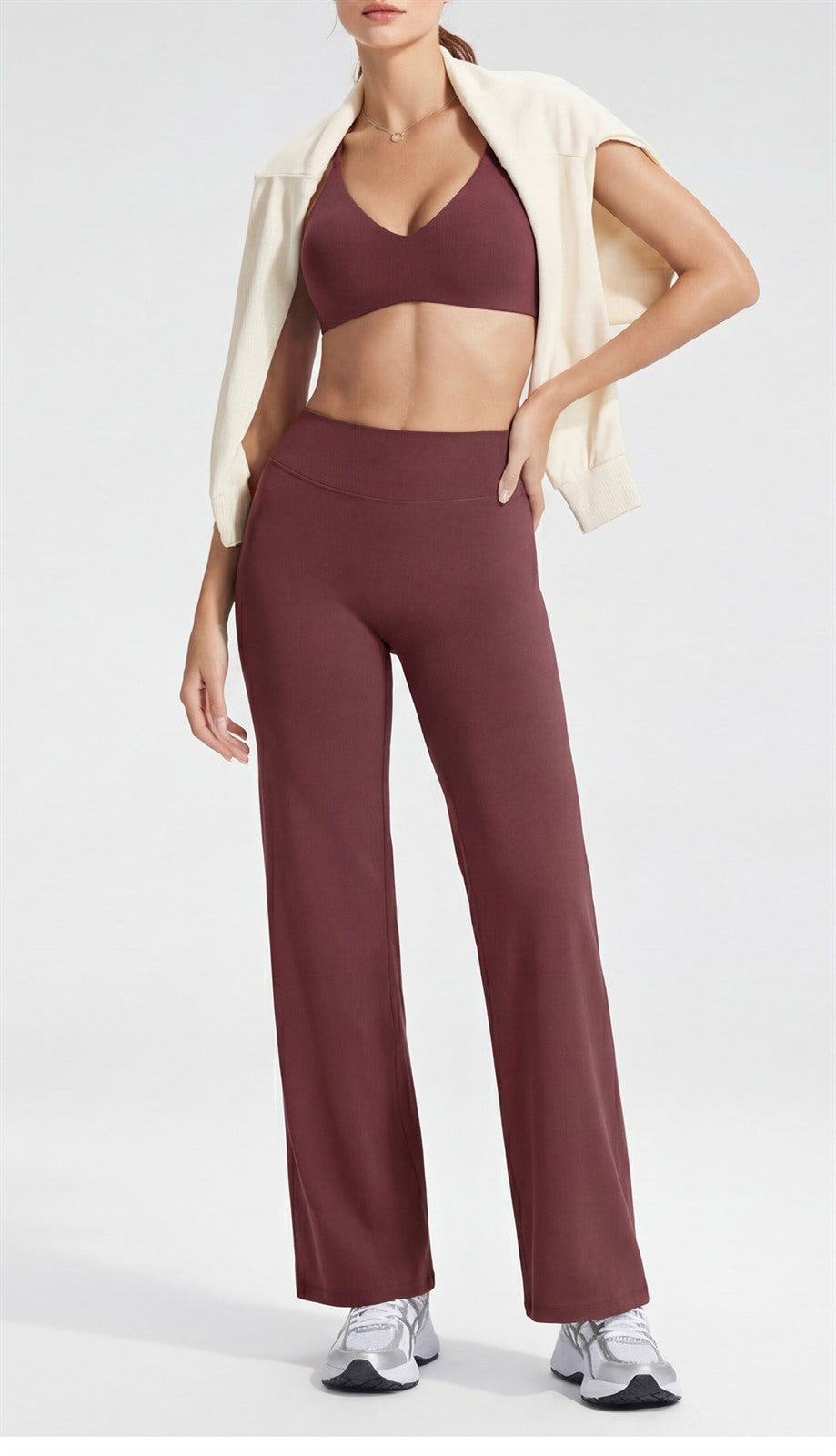 Wide-leg yoga pants in Ruby Red worn full length