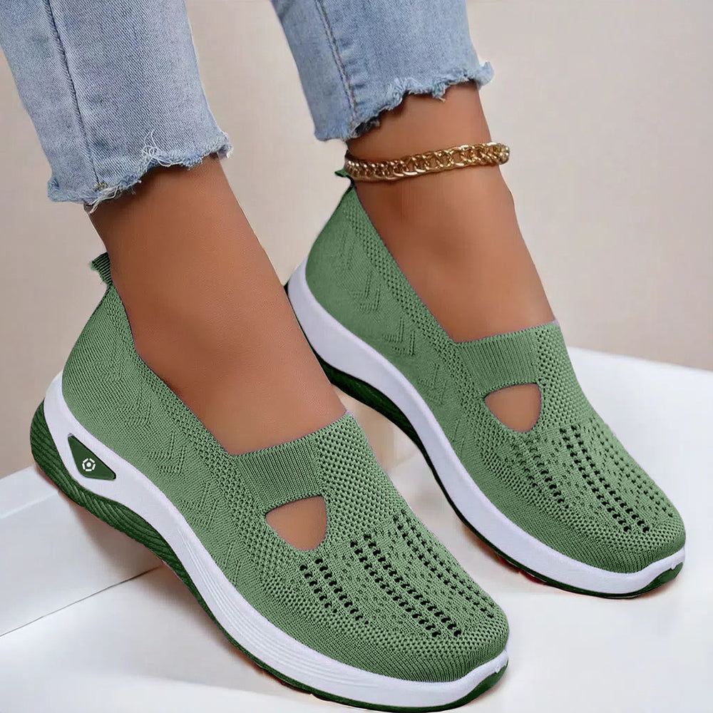 Mesh slip-on walking flats in Army Green, worn