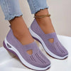 Mesh slip-on walking flats in Lavender Purple, worn