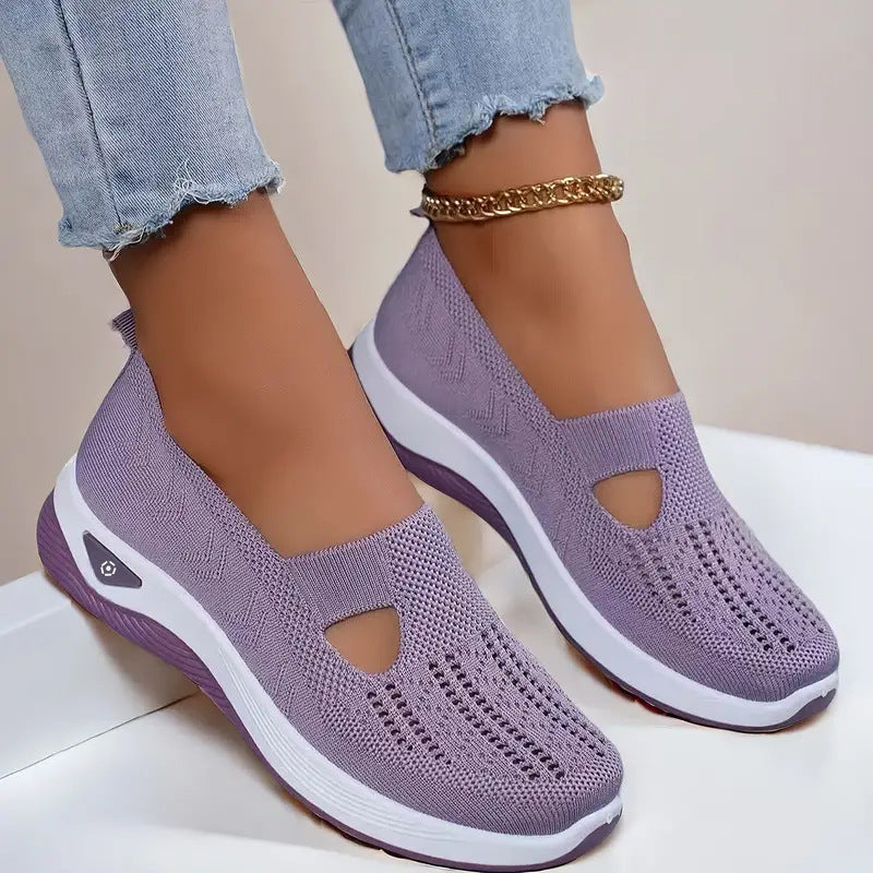 Mesh slip-on walking flats in Lavender Purple, worn