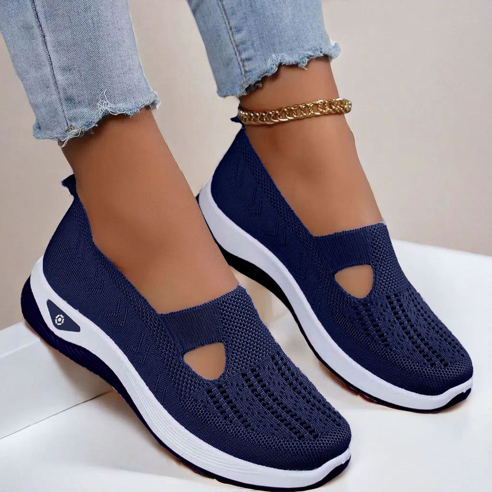 Mesh slip-on walking flats in Blue, worn