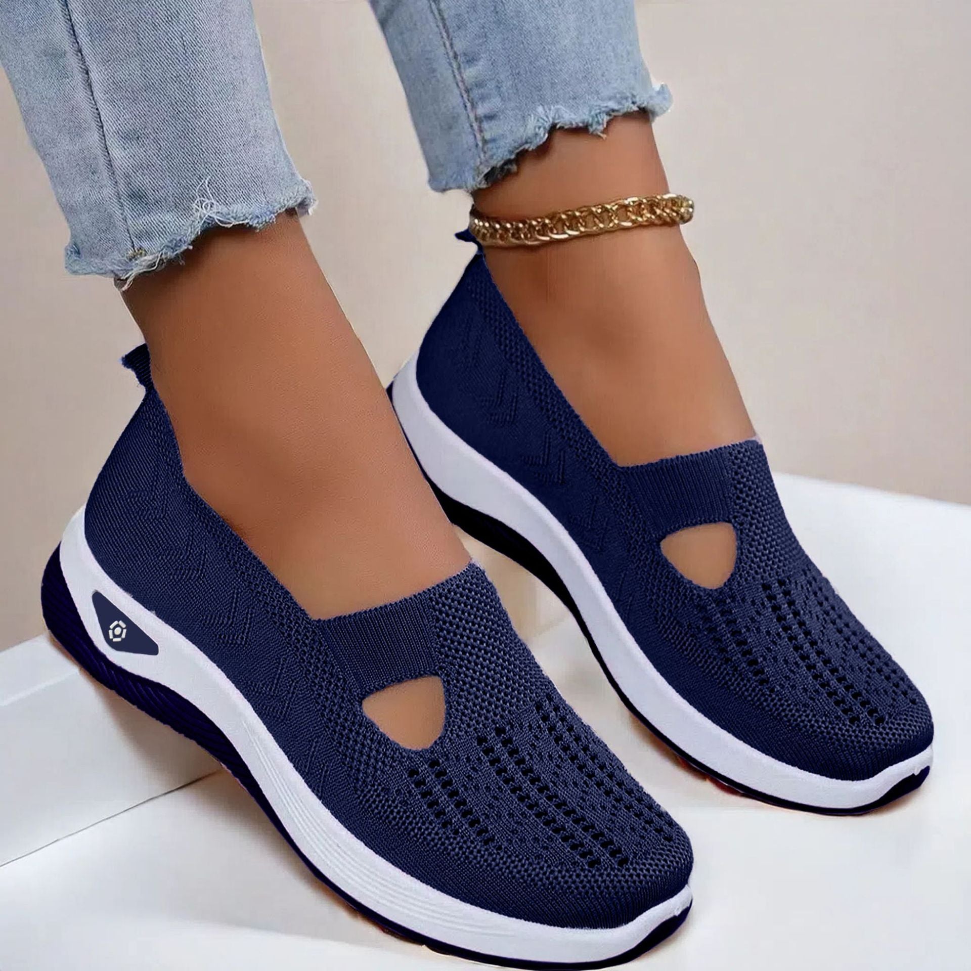 Mesh slip-on walking flats in Blue, worn