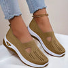 Mesh slip-on walking flats in Coffee, worn