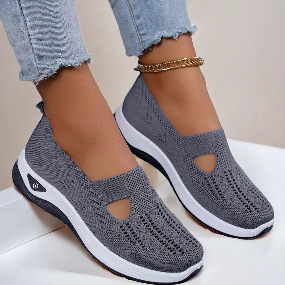 Mesh slip-on walking flats in Dark Gray, worn