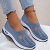 Mesh slip-on walking flats in Sky Blue, worn