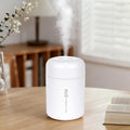 Humidificador de niebla fría decorativo con luz nocturna