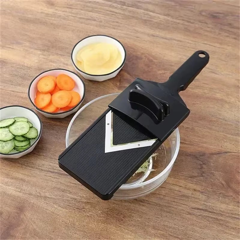 Mandoline slicing cucumber thin slices with safety hand guard