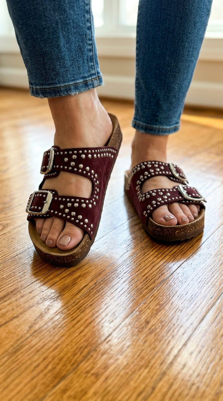 Burgundy studded suede footbed sandals worn with white dress