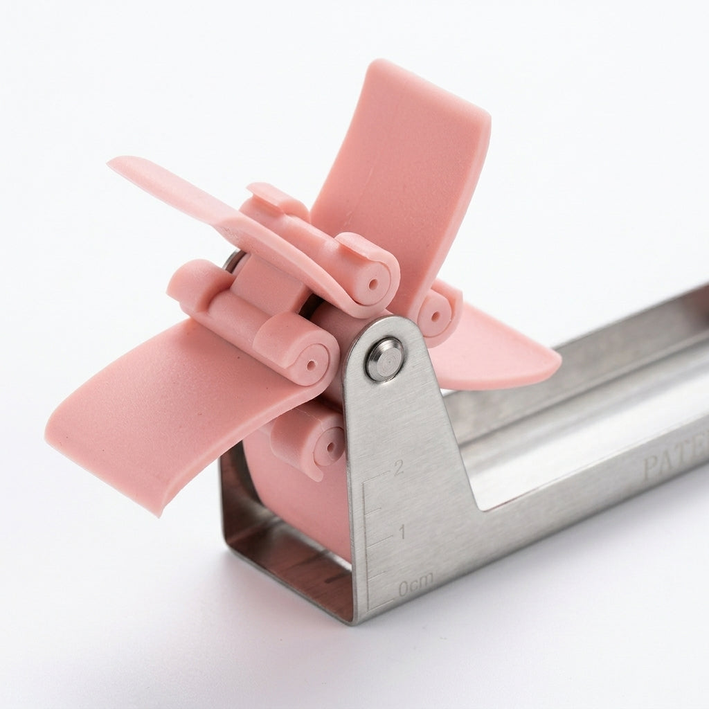 Windmill watermelon cube slicer, stainless steel with pink blades