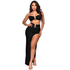 Black bandeau top and black high slit maxi skirt set with gold-tone hardware