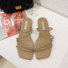 Khaki strappy flat slide sandals - pair, top view