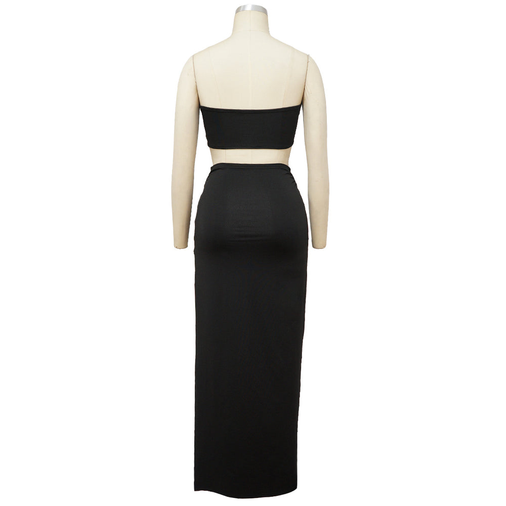 Back view of black bandeau top and maxi skirt set on mannequin