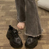 Black chunky platform sneakers styled photo
