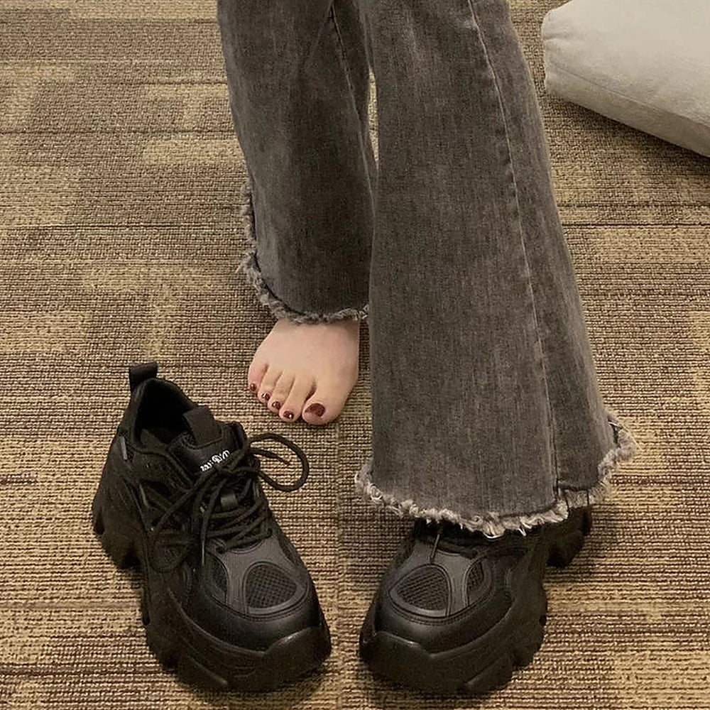 Black chunky platform sneakers styled photo