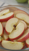 Apple Peeler Corer Slicer hand crank in use - peels cores and slices an apple