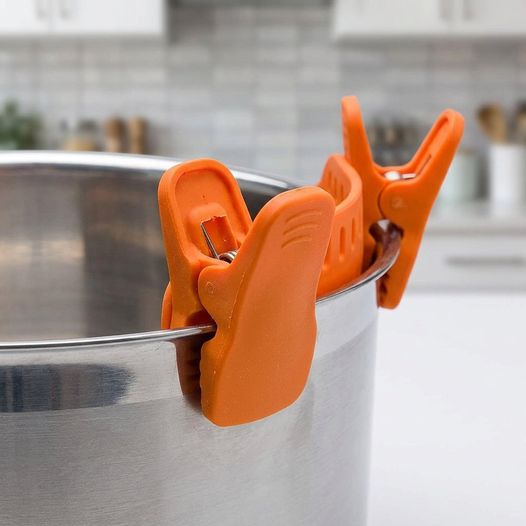 Close up of the silicone clamps gripping the pot rim